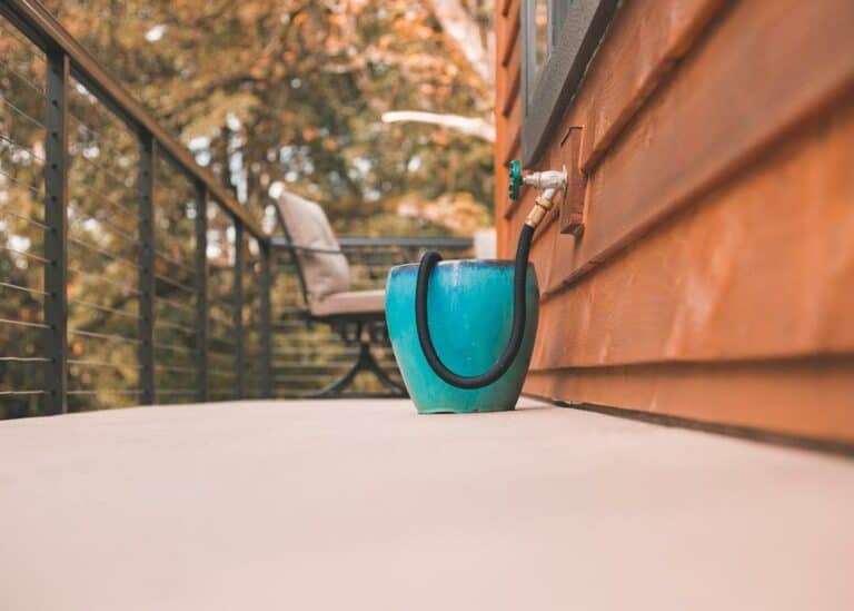 a blue bucket on a beautiful waterproof deck