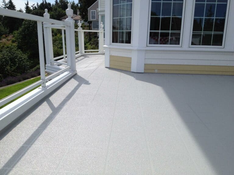 a white pattern urethane deck with beautiful windows
